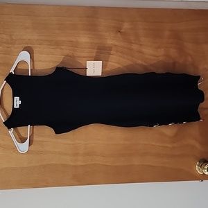 Mini black dress with O rings on the sides - xs